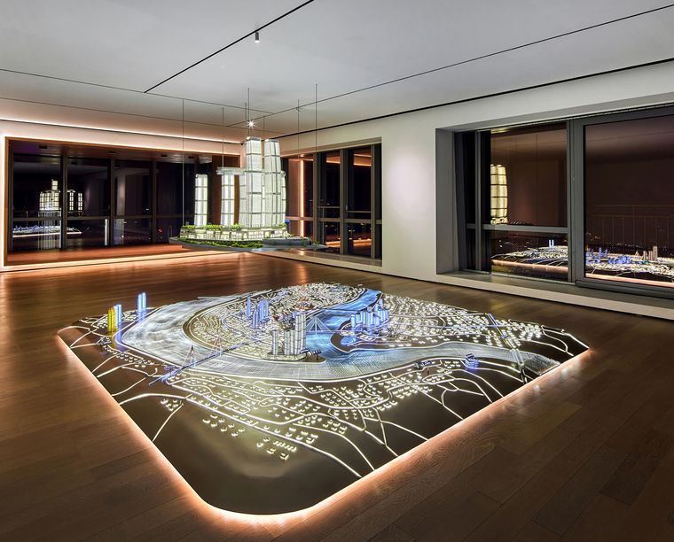 Sales centre holding an illuminated master plan and companion models