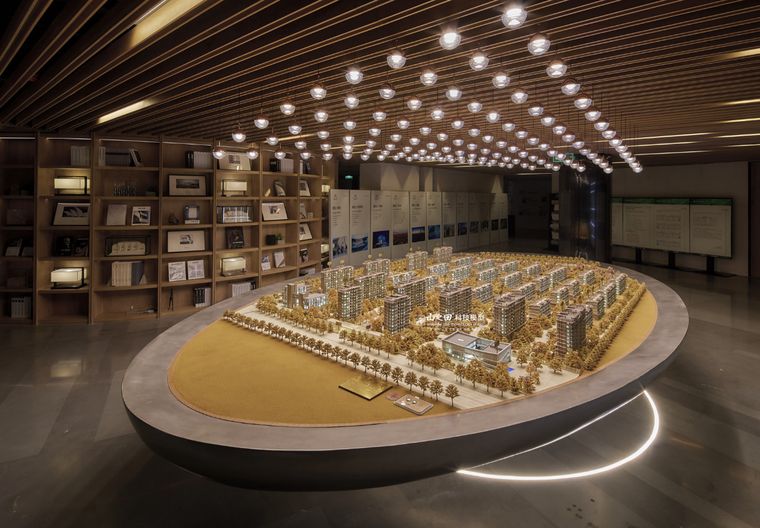 Oval model of a residential district in a wide exhibition hall