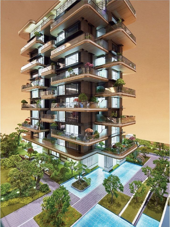 Model of a residential tower with planted balconies above the pools and gardens