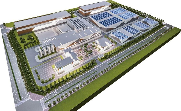 Model of a factory complex with yards, roads and planted areas