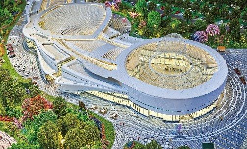 Model of a leisure centre with an oval roof and the surrounding plazas