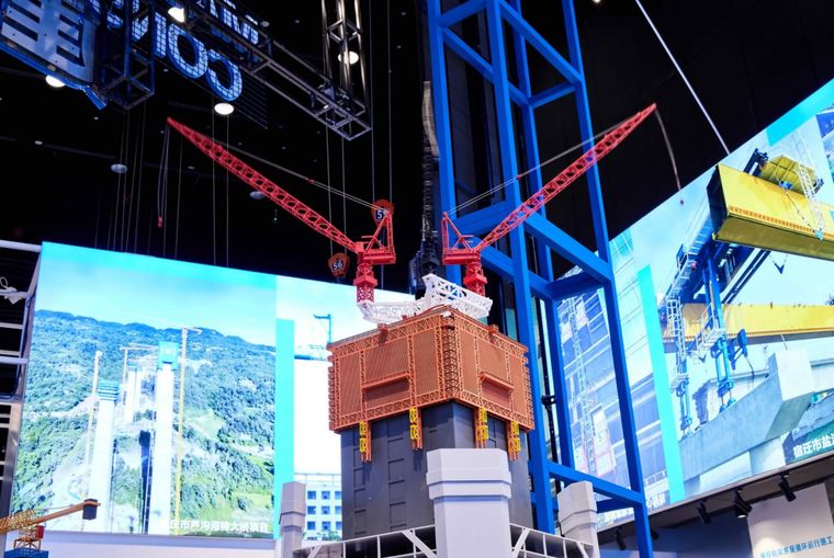 Offshore platform and installation cranes in front of display screens