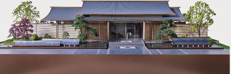 Model of a traditional-style entrance with trees and water features