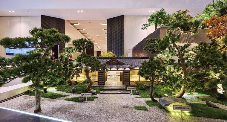 Model of a Japanese-style entrance with pines and a gravel court