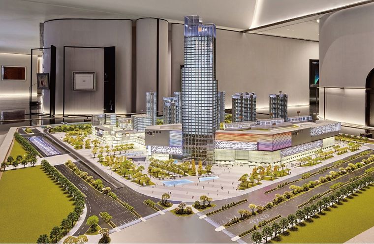 Model of a multi-building business centre with roads and plazas in a showroom