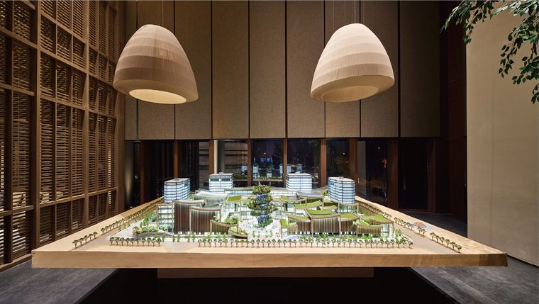 Office tower model with its retail podium and the surrounding roads