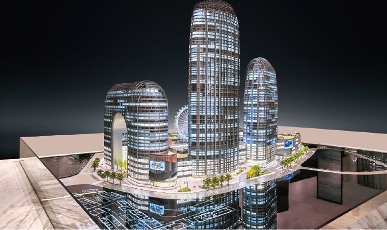 Office tower model under blue light in a sales gallery