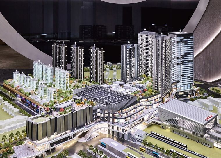 Office tower model with a glazed facade and internal lighting