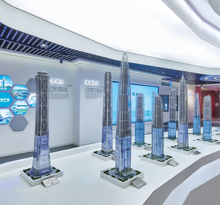 A row of supertall towers in a corporate showroom