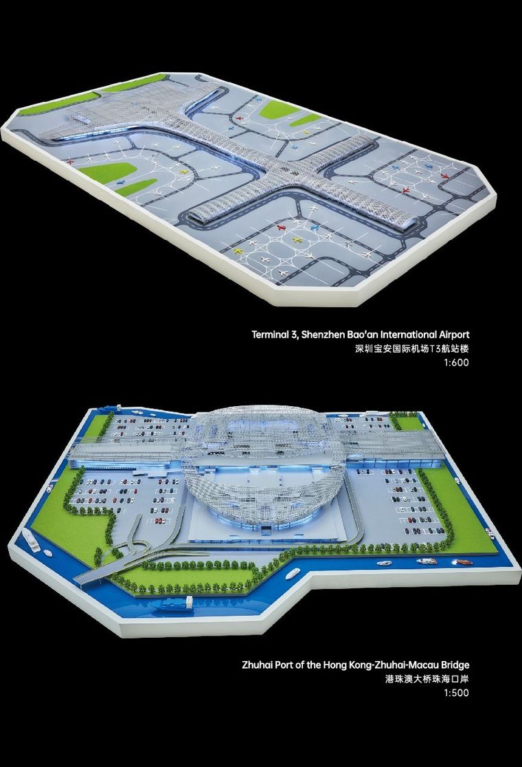 Railway station model with a flowing roof, tracks, platforms and roads