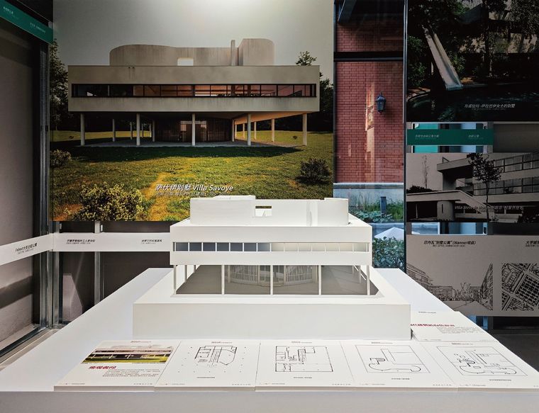Model of a modernist villa on pilotis with its architectural drawings