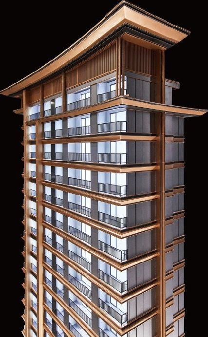 Close view of the crown of a traditional-style residential tower