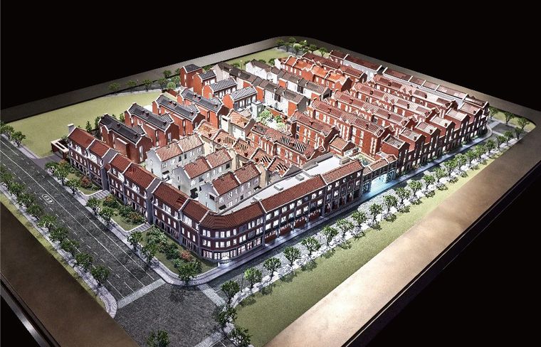 Model of a district of European-style terraced villas, lit at night