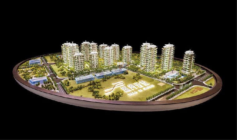 Model of a complete residential project on an oval base against black