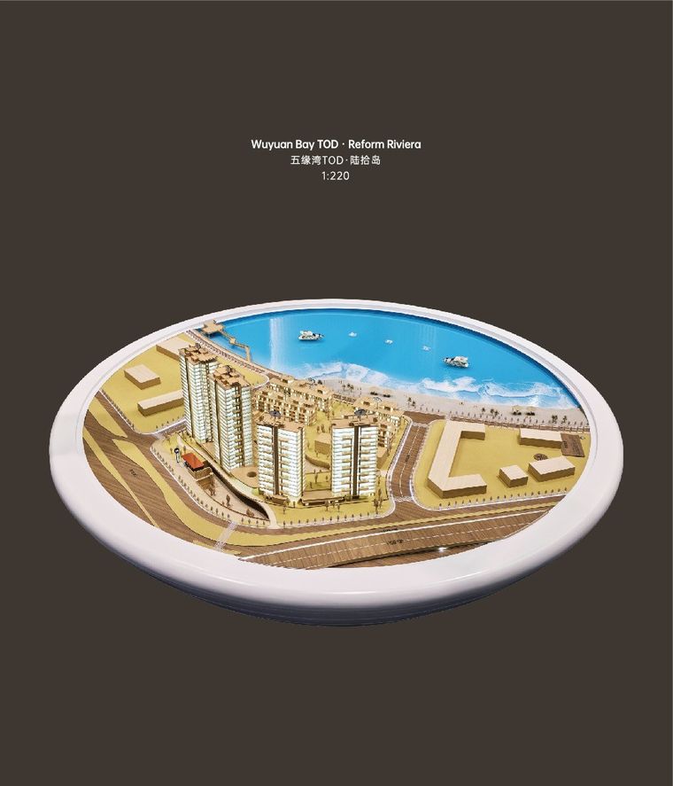 Model of a coastal project on a circular white base