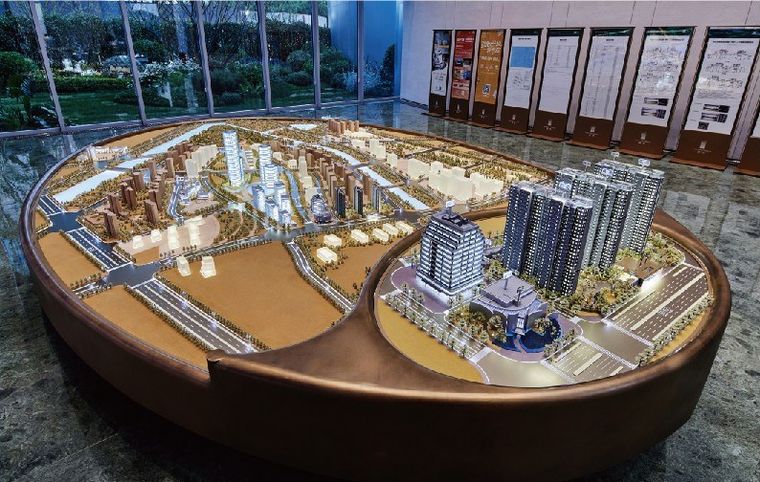 Model of two residential projects on a twin copper base