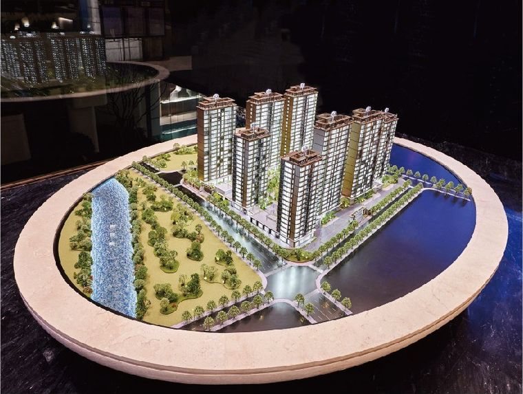 Model of a residential complex on an oval marble base with the canal