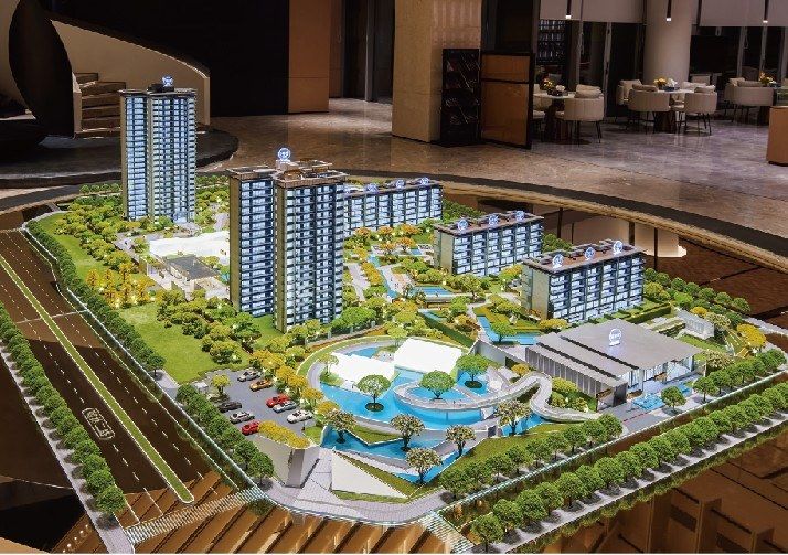 Model of a complete residential complex with the club, pools and roads