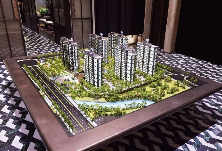 Model of a residential complex on a copper base with the canal and roads