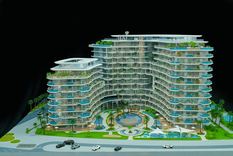 Residential complex with white terraces and pools on several levels