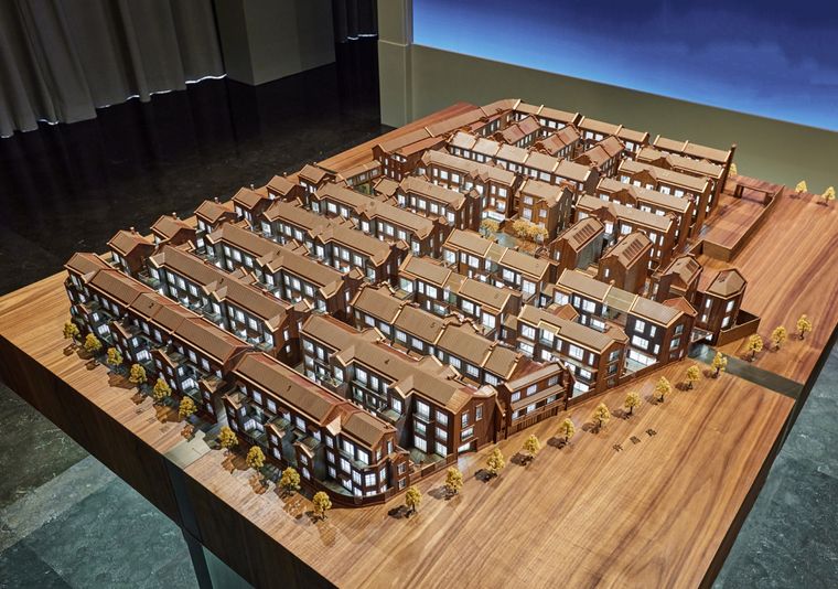 Rows of terraced houses on a wooden base