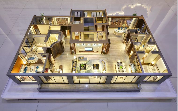 Interior cutaway of a residential floor showing room layout and furniture