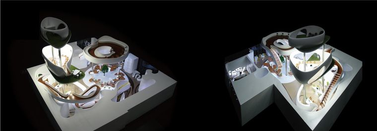 Two cutaway models of a luxury reception hall with internal lighting