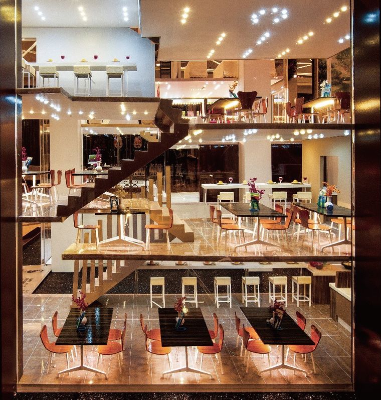 Cutaway model of a café and restaurant over three floors