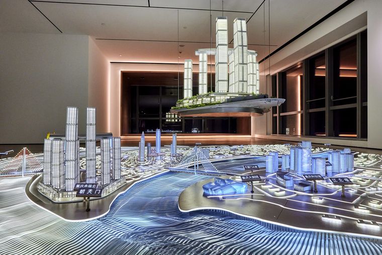 Interactive city display with models suspended above the table