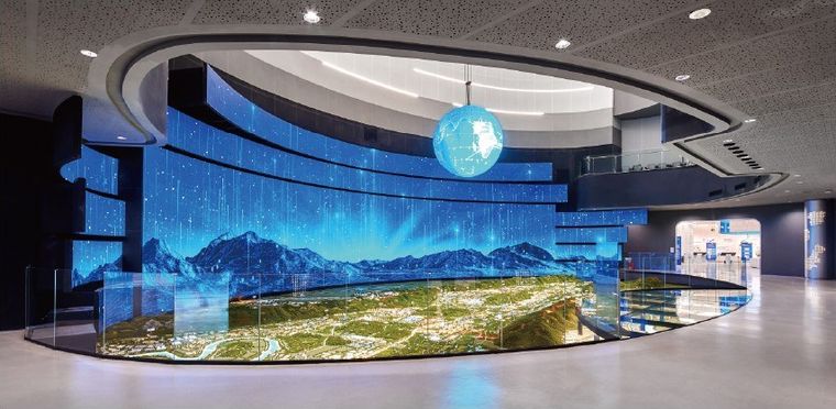 Immersive hall with a regional model, a mountain screen and a suspended globe