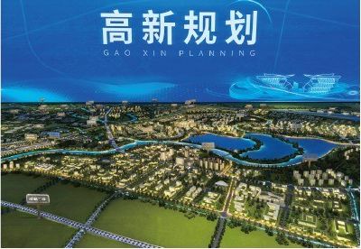 Regional model lit at night before a screen carrying the name of the plan