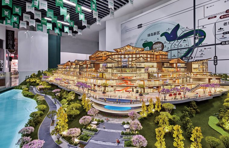 Large leisure and retail complex with dense planting and walkways