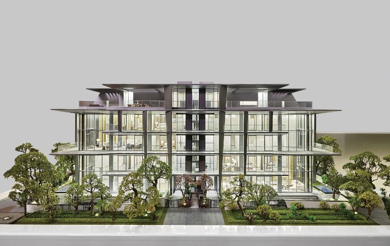 Model of a low-rise residential building facade over four floors with trees