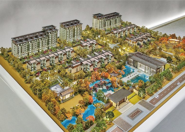 Model of a district of terraced villas with gardens and pools