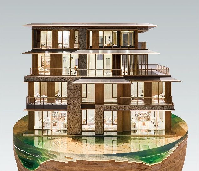 Model of a contemporary villa over four floors on a stone base