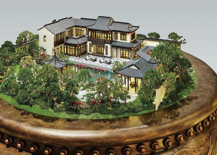 Model of a traditional Chinese villa with the garden and pond