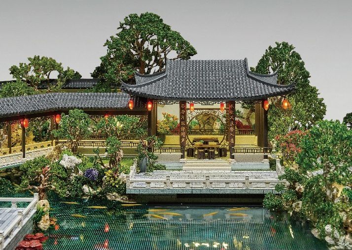 Model of a traditional Chinese courtyard with the pond and pavilion