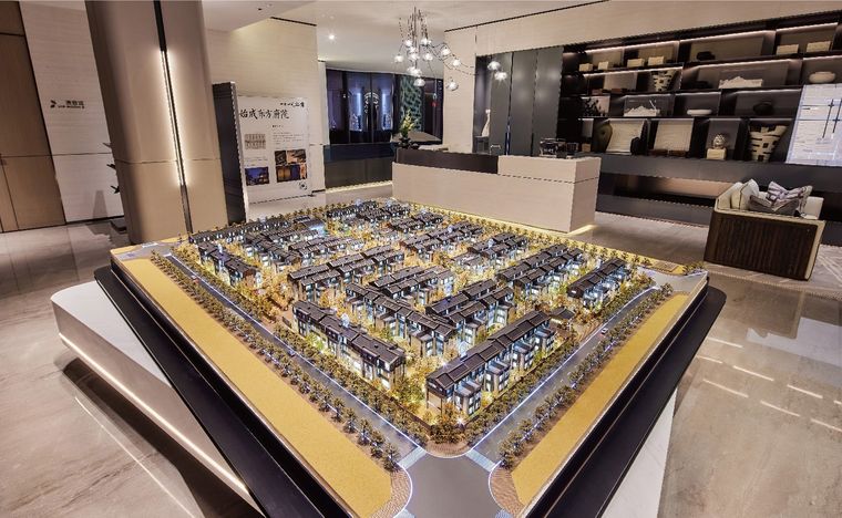 Model of an extended district of terraced villas in a showroom