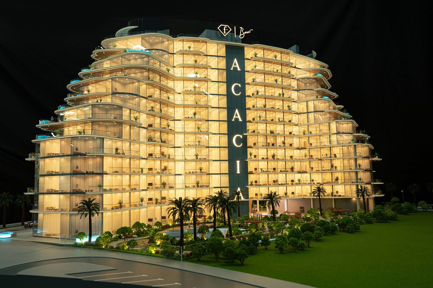 Residential complex model with lighting and an interactive display wall